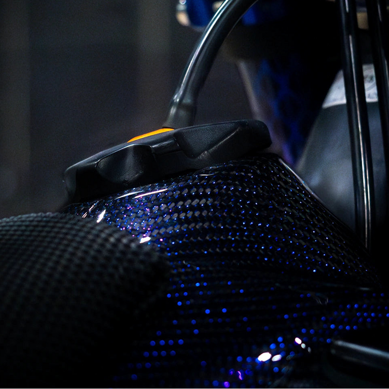 KTM EXC-F with a blue reflective carbon fiber tank cover