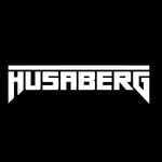 White 'Husaberg' logo on a black background

